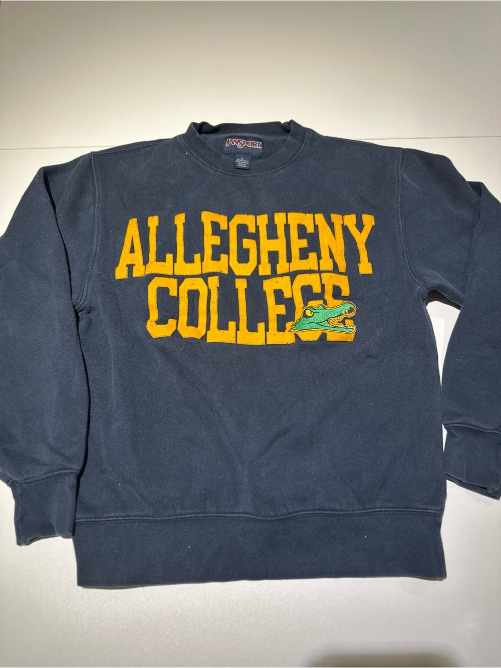 Jansport Navy Crewneck Sweatshirt with Yellow Collegiate Lettering